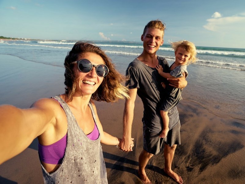 Family Taking Selfie on the Beach