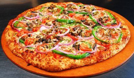 Pizza with mushrooms pepper onions and olives